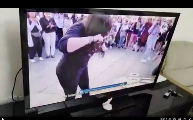 Screen capture from video of an interruption by hackers to Iran's state television network broadcast showing past protest by women against the regime, June 18, 2025. (X: Used in accordance with Clause 27a of the Copyright Law)